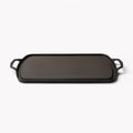 Side profile of the Field Long Cast Iron Griddle, showing its low rim and loop handles thumbnail