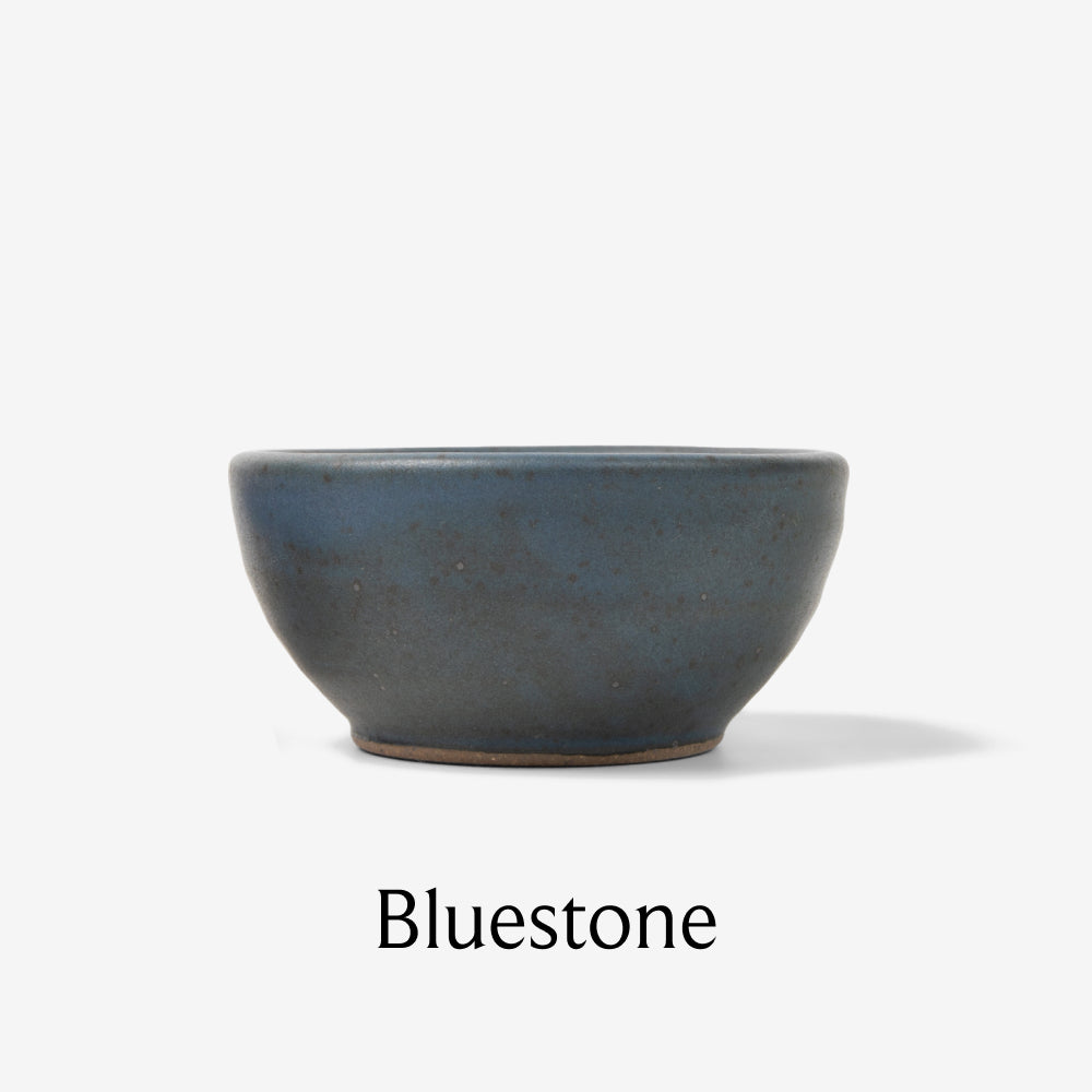 Field Tiny Ceramic Bowl in the Bluestone glaze, front view on a white background