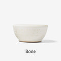 Side view of the Tiny Ceramic Bowl from Field Company in speckled bone glaze thumbnail