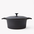 Side profile of the Field Cast Iron Dutch Oven with domed lid and loop handles, studio shot thumbnail