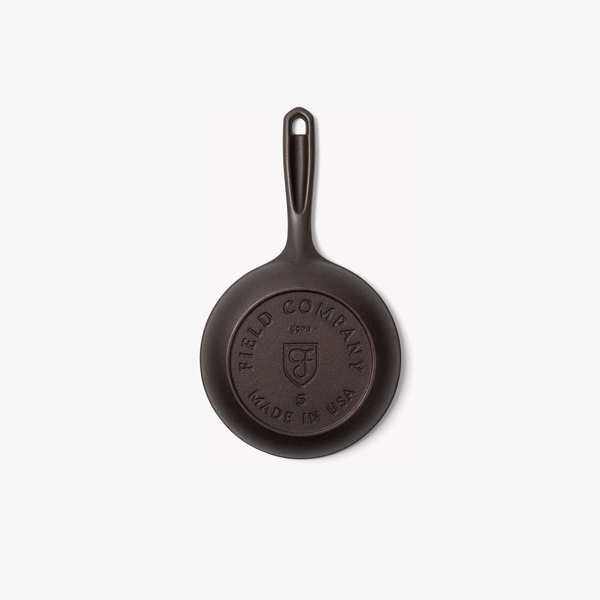 Underside of the No.5 Cast Iron Skillet showing the Field Company and Made in USA stamps