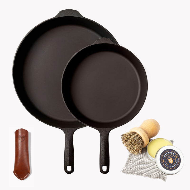 The Summer Celebration Set: two Field Skillets, leather handle cover, scrub brush, chain mail, and seasoning oil