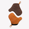 Pair of Field Leather Oven Mitts in tan and brown laid flat, overhead view thumbnail