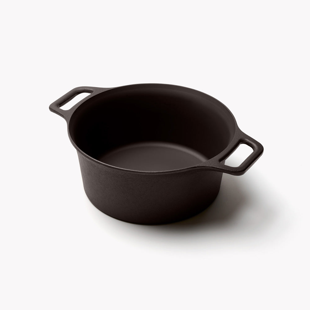 Angled view of the open No.8 Field Cast Iron Dutch Oven with loop handles on each side