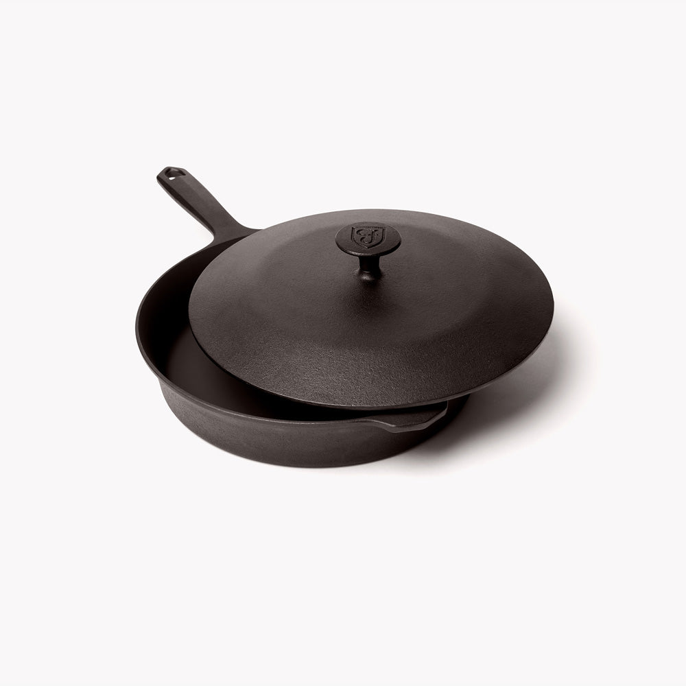 Angled view of the No.8 Field Cast Iron Skillet Lid resting slightly offset on its skillet