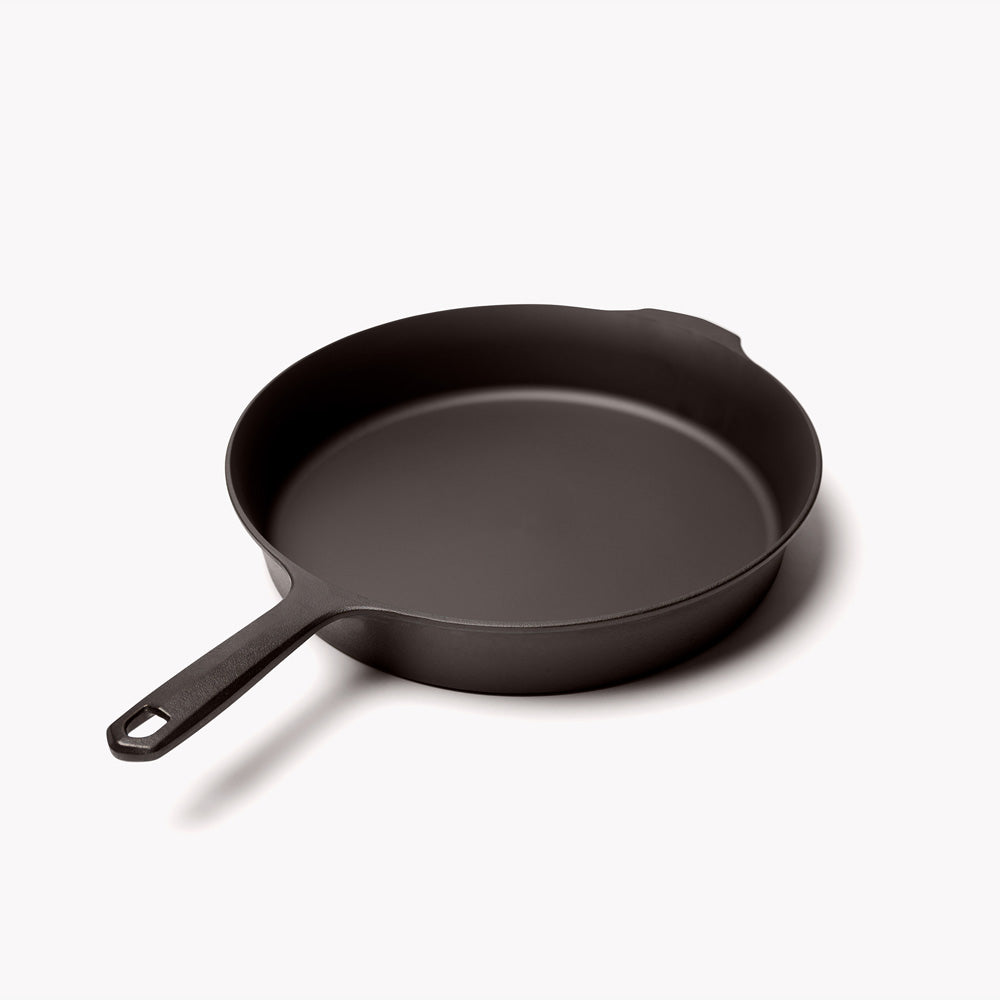 No.10 Field Cast Iron Skillet angled view with handle in the foreground, showing the hanging hole