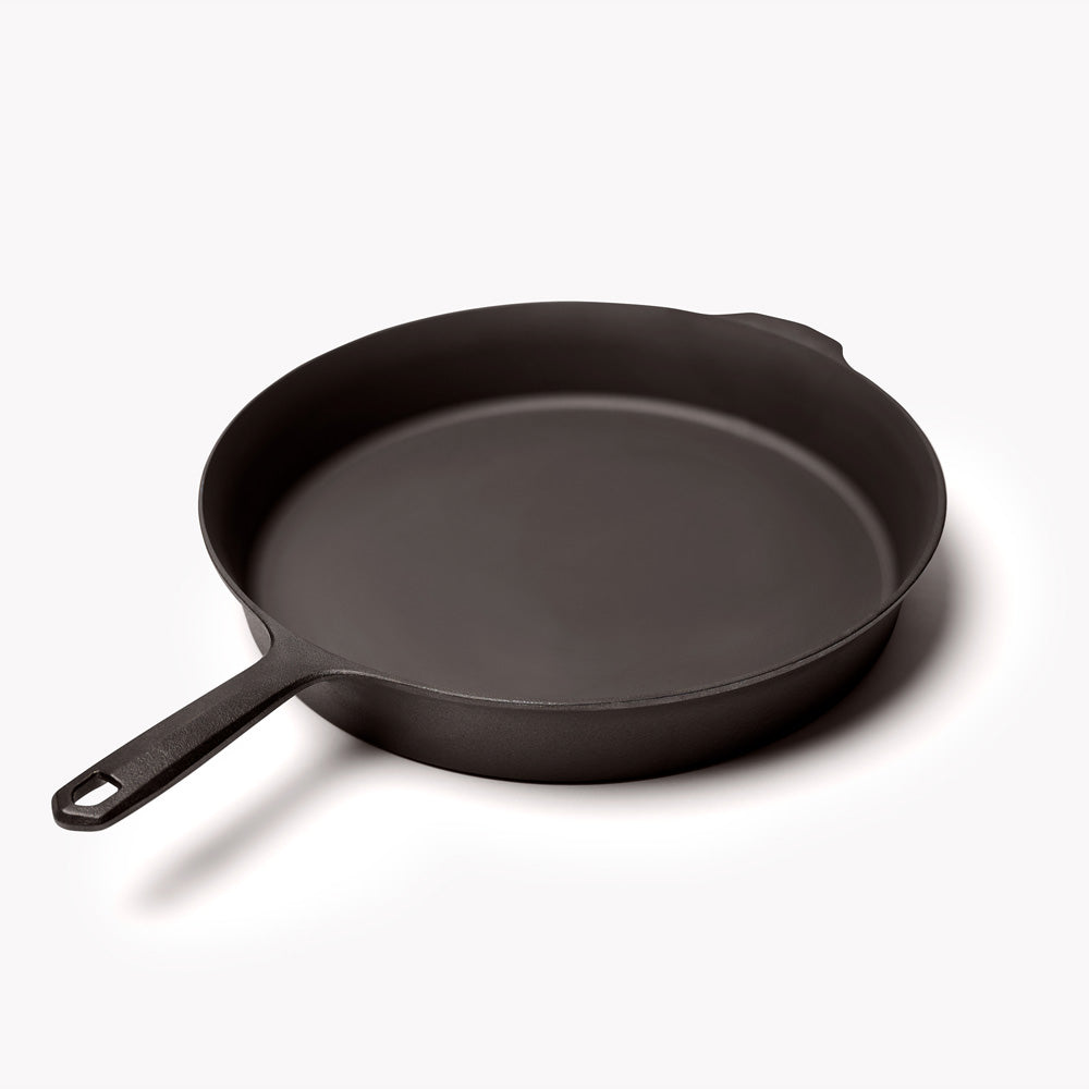 No.12 Field Cast Iron Skillet angled view with handle in the foreground, showing the hanging hole