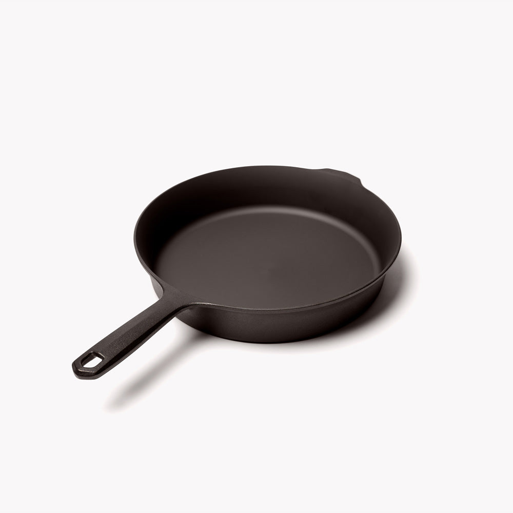 No.8 Field Cast Iron Skillet angled view with handle in the foreground, showing the hanging hole