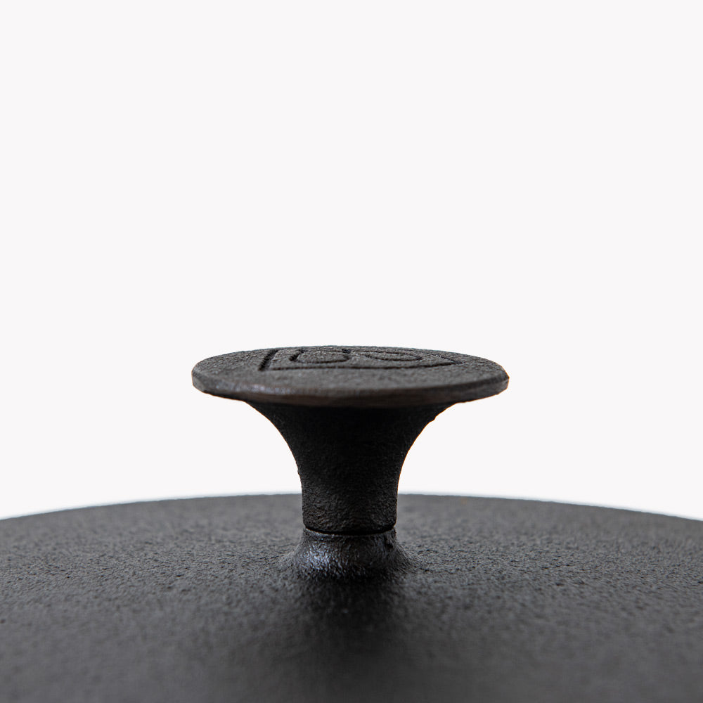 Close-up of the flared cast iron knob on the Field Skillet Lid