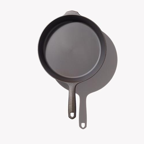 Overhead view of the No.8 Field Cast Iron Skillet with helper handle at top, on white background