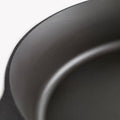 Close-up of the Field Skillet rim and smooth machined cooking surface thumbnail