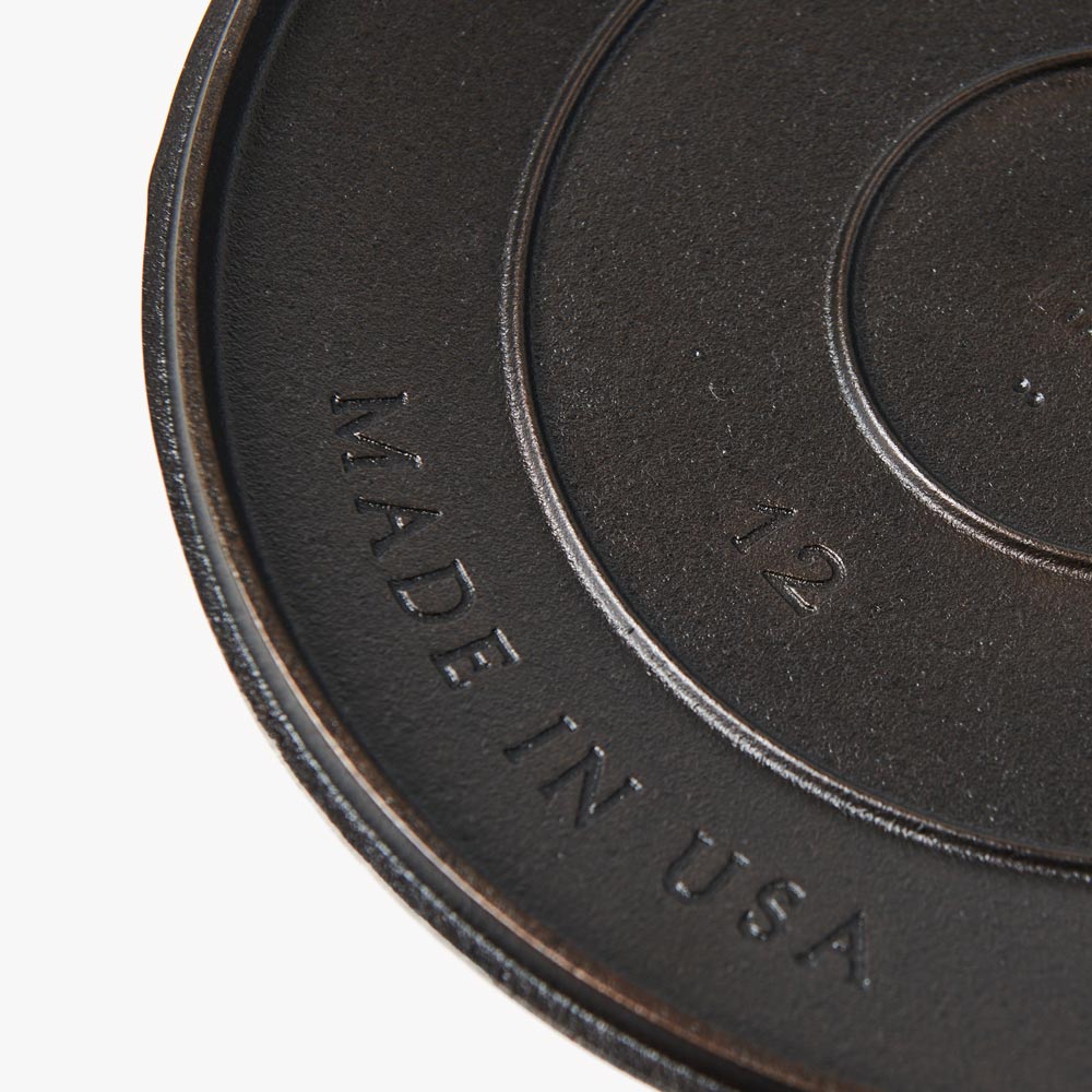Close-up of the underside of the No.12 Field Cast Iron Skillet Lid showing the Made in USA stamp