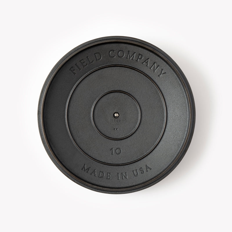 Underside of the No.10 Cast Iron Skillet Lid showing the Field Company and Made in USA stamps
