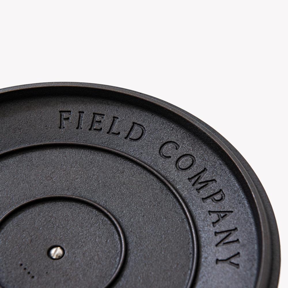 Close-up of Field Company lettering cast into the top of the Cast Iron Skillet Lid