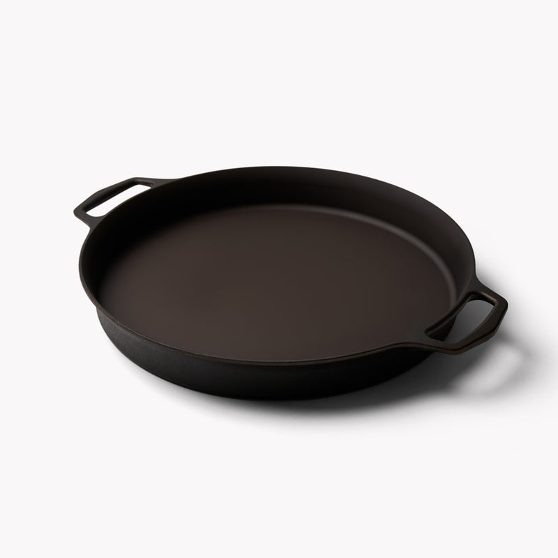 Angled view of the No.16 Double-Handled Field Cast Iron Skillet with a cast loop handle on each side