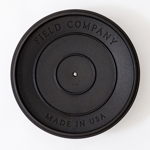 Underside of the Field Cast Iron Skillet Lid showing the Field Company and Made in USA stamps